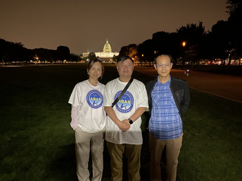 Ruofan Wang, Renjiang Xie, and Ge Yan at the National Mall astronomy event